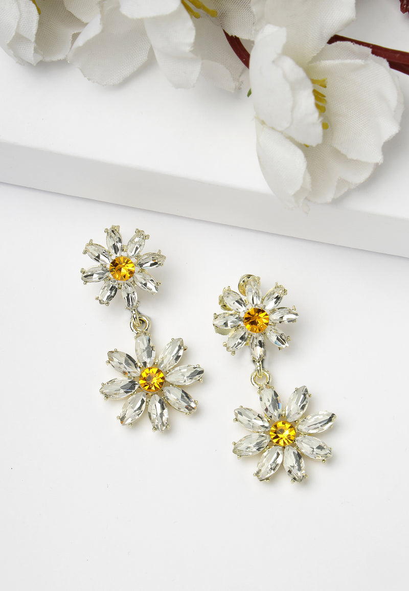 Boucles d'oreilles pendantes marguerite blanche