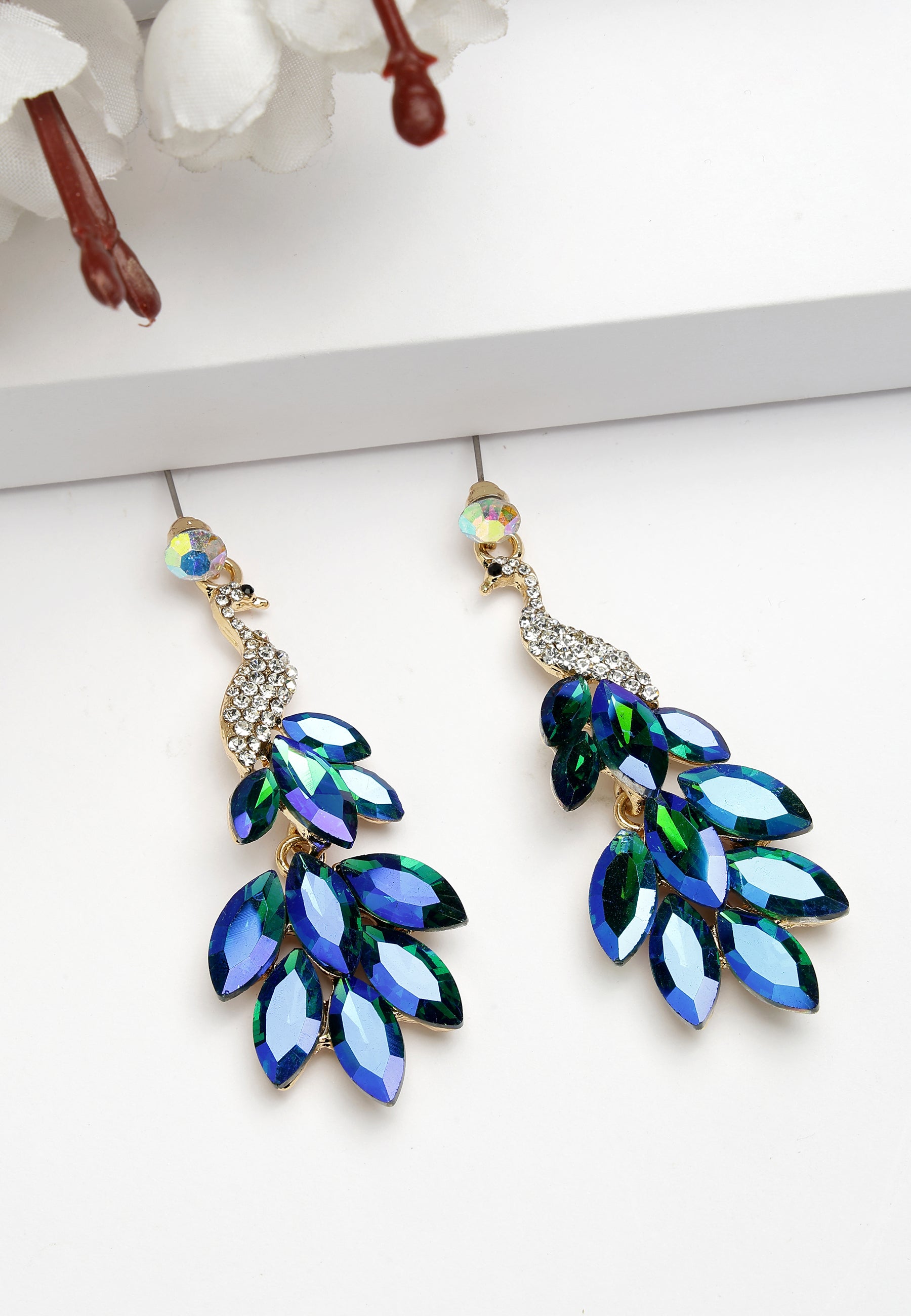 Hermosos aretes de pavo real