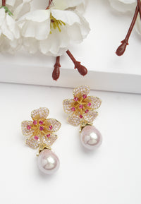 Boucles d'oreilles pendantes florales en zircone